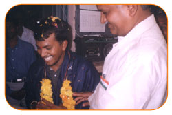 Mr. N Bitra Receiving A memento from Pinnamaneni Venkateswara Rao, Minister Technical Education, on the occasion of 56th Independence Day (15th August 2003). Bitra Net Pvt. Ltd., has donated two letest configuration computers to a School located in Puttagunta (Krishna Dist, Andhra Pradesh) Mr. N Bitra Receiving A memento from Pinnamaneni Venkateswara Rao, Minister Technical Education, on the occasion of 56th Independence Day (15th August 2003). Bitra Net Pvt. Ltd., has donated two letest configuration computers to a School located in Puttagunta (Krishna Dist, Andhra Pradesh)